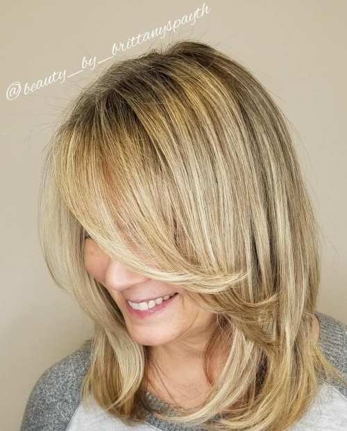 Medium Feathered Blonde Cut
