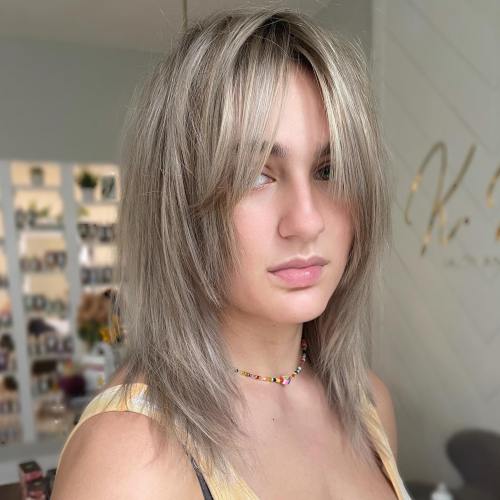 Ash Blonde Layered Style for Medium Locks Sleek Wolf Haircut for Short Hair