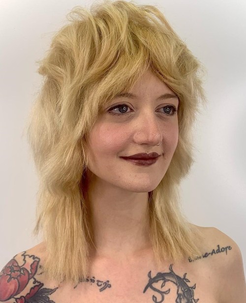 Choppy Blonde Wolf Cut Modern Mullet with Textured Top