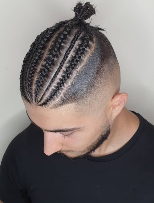 Classic Man Bun with Cornrow Braids Thin Cornrows into Men Bun with Undercut Sides