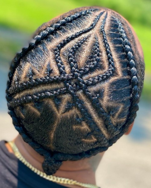 Intricate Cornrows with a Top Knot Interesting Men's Braids Pattern