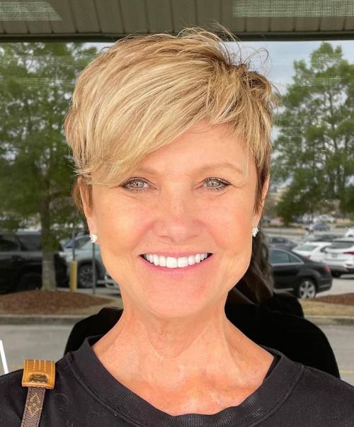 Youthful Blonde Feathered Pixie With Side Bangs