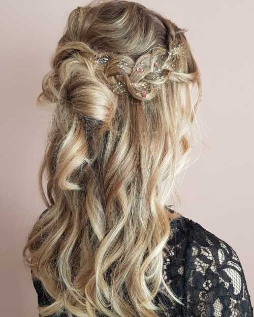 Hairstyle With a Loose Braid Sprayed With Glitter Spray
